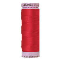 Spool of Mettler Silk Finished Cotton Thread in colour Poinsettia 0102
