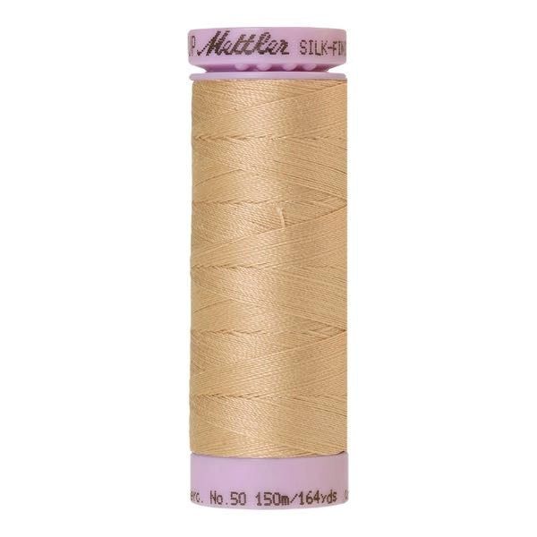 Spool of creamy beige coloured cotton thread - Oat Straw code 0260