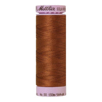 Spool of brown coloured cotton thread - Penny code 0262