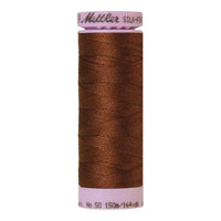 Spool of reddy brown coloured cotton thread - Redwood code 0263