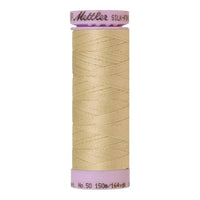 Spool of creamy yellow coloured cotton thread - Ivory code 0265