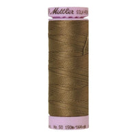 Spool of golden brown coloured cotton thread - Amygdala code 0269