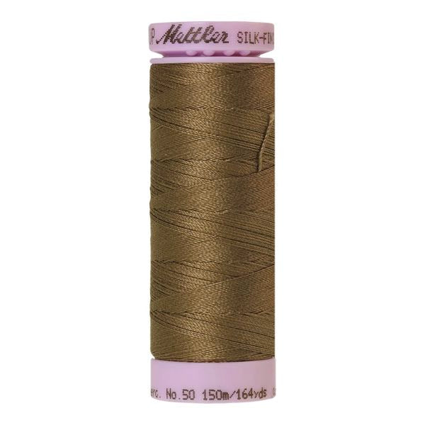 Spool of golden brown coloured cotton thread - Amygdala code 0269