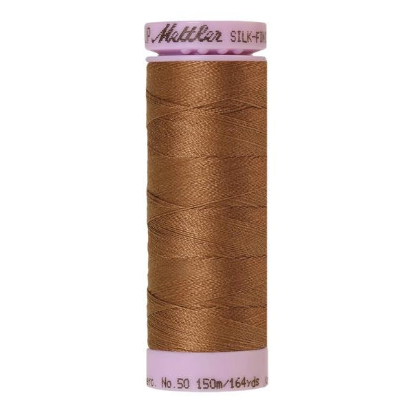 Spool of light brown coloured cotton thread - Hazelnut code 0281