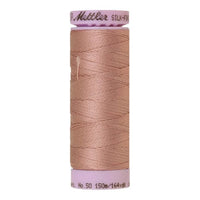 Spool of browny lilac cotton thread - code 0284