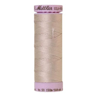 Spool of greyish lilac cotton thread - code 0319