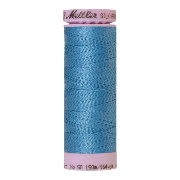 Spool of blue cotton thread - Reef Blue code 0338