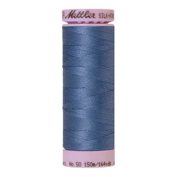 Spool of smoky blue coloured cotton thread - code 0351