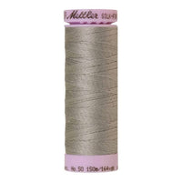 Spool of beige-grey coloured cotton thread - Titan Gray code 0413