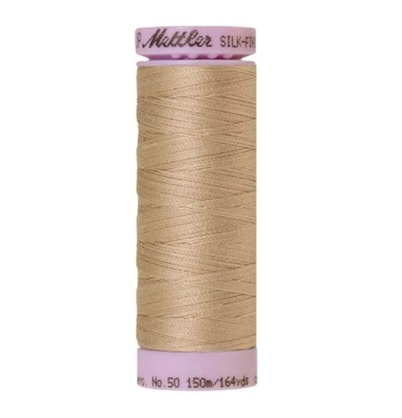 Spool of beige coloured cotton thread - Straw code 0538