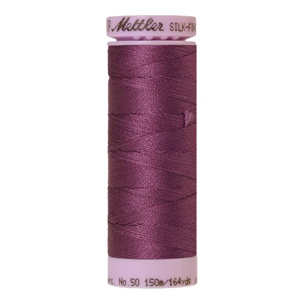 Spool of orchid purple coloured cotton thread - code 0575