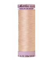 Spool of Mettler Silk Finished Cotton Thread in colour Flesh 0600
