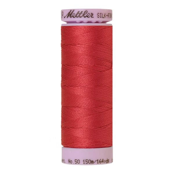 Spool of Mettler Silk Finished Cotton Thread in colour Blossom 0628