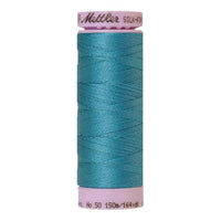 Spool of turquoise blue coloured cotton thread - Glacier Blue code 0722