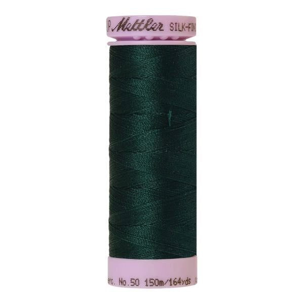 A spool of dark swamp green cotton thread - code 0757