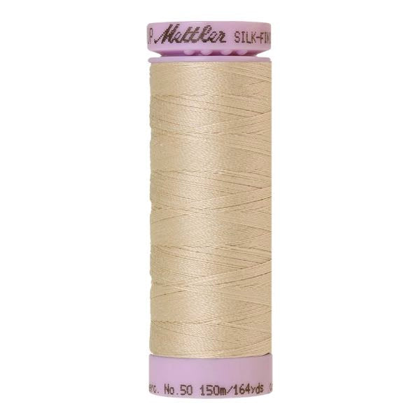 Spool of creamy beige coloured cotton thread - Pine Nut code 0779