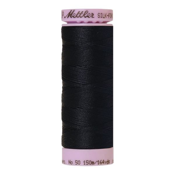 Spool of Mettler cotton thread in darkest blue - code 0821
