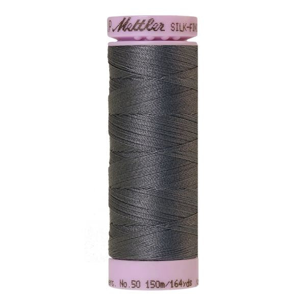 Spool of denim grey blue coloured cotton thread - code 0878
