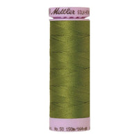Spool of green coloured cotton thread - Moss Green code 0882