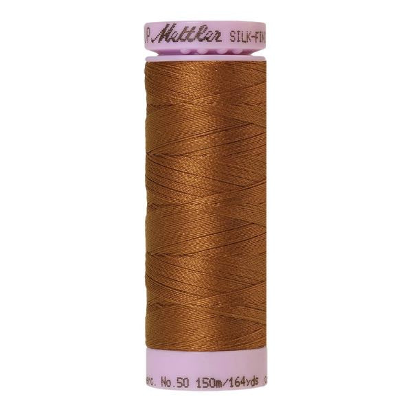 Spool of light brown coloured cotton thread - Light Cocoa code 0900