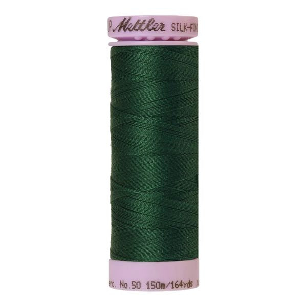 A spool of verdant green cotton thread code 0905