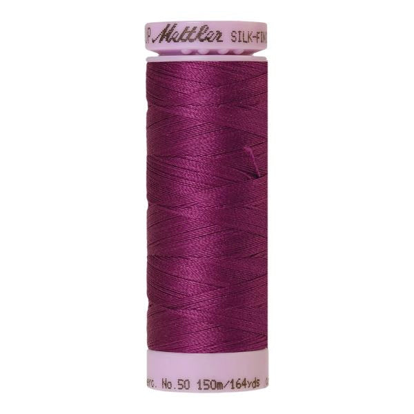 Spool of purple cotton thread - code 1062