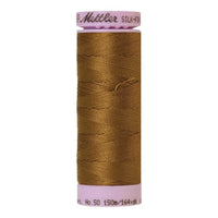 Spool of dark honey coloured cotton thread - Golden Grain code 1311