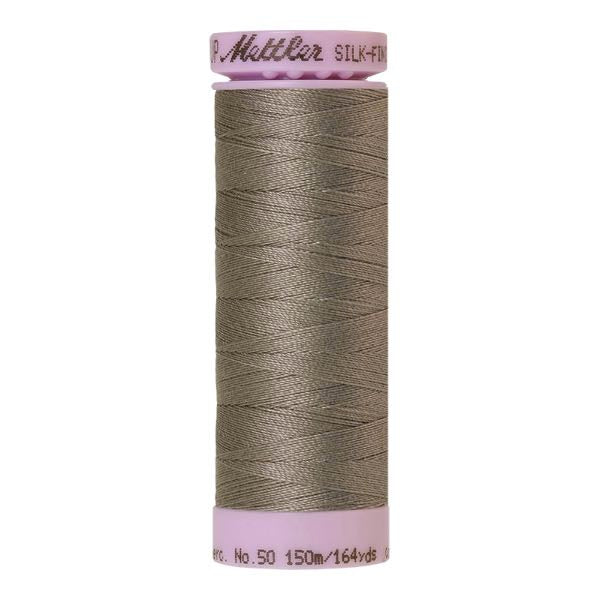Spool of dark beige grey coloured cotton thread - December Sky code 1358