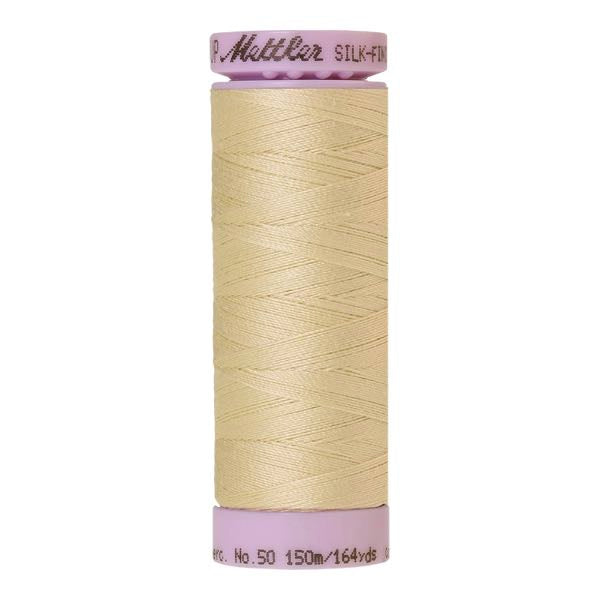 Spool of creamy yellow coloured cotton thread - Lime Blossom code 1384