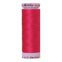 Spool of Mettler Silk Finished Cotton Thread in colour Fuschia 1421
