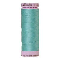 Spool of aqua blue coloured cotton thread - code 1440