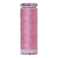 Spool of pinky lilac coloured cotton thread - code 1523