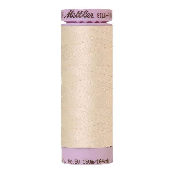 Spool of cream coloured cotton thread - Dew code 1531