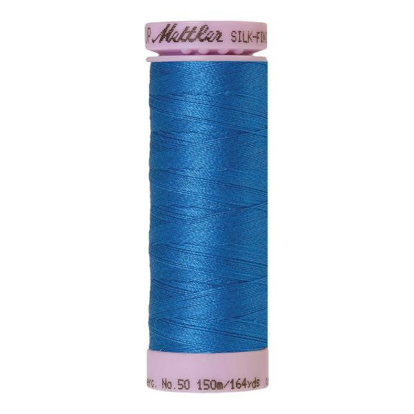 Spool of bright blue cotton thread - French Blue code 2049