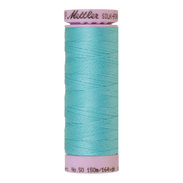 Spool of light turquoise coloured cotton thread - Blue Curacao code 2792