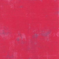 Distressed look raspberry pink quilting fabric