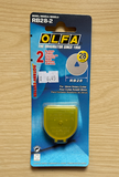 A pack of two 28mm Replacement Blades for a rotary cutter